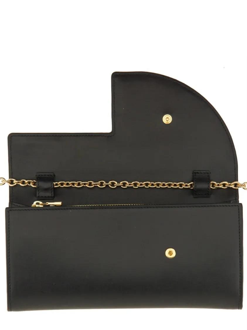 Patou Clutches Black Leather Pochette in zwart