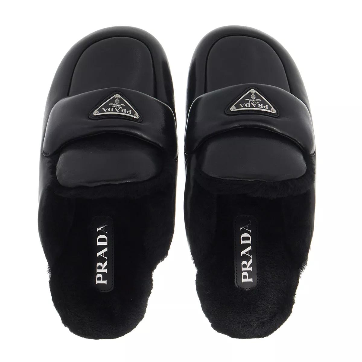 Prada store black mules