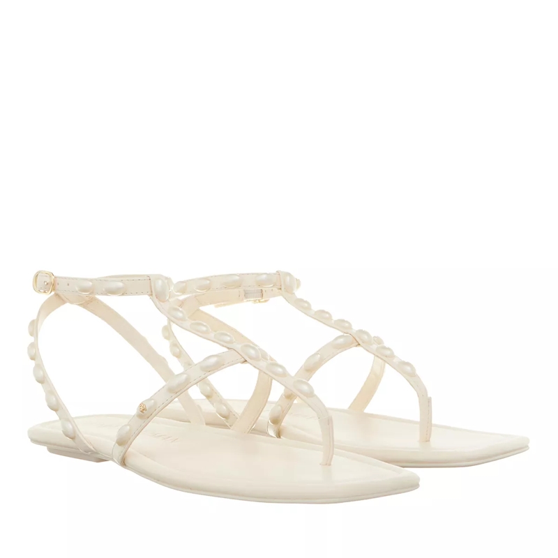 Stuart Weitzman Riemchensandalen Pearlita Flat Sandal Seashell