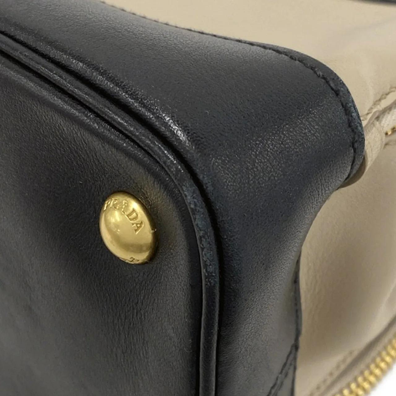Prada Crossbody bags 2013-2023 Bicolor Soft Calf Double Zip Dome Satche in bruin