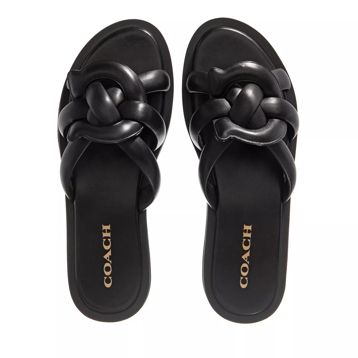 Women's coach store flip flops black