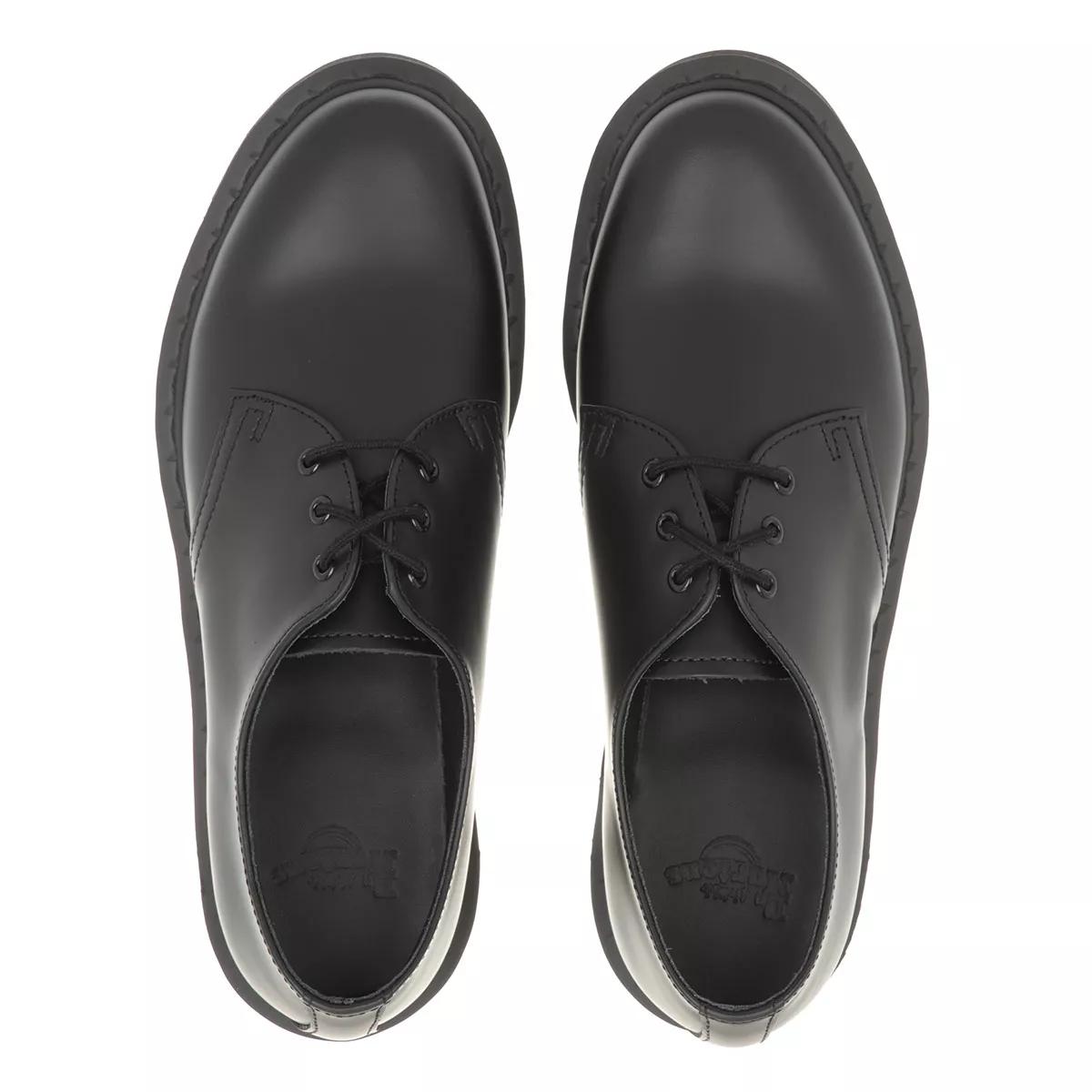 1461 mono black store dr martens