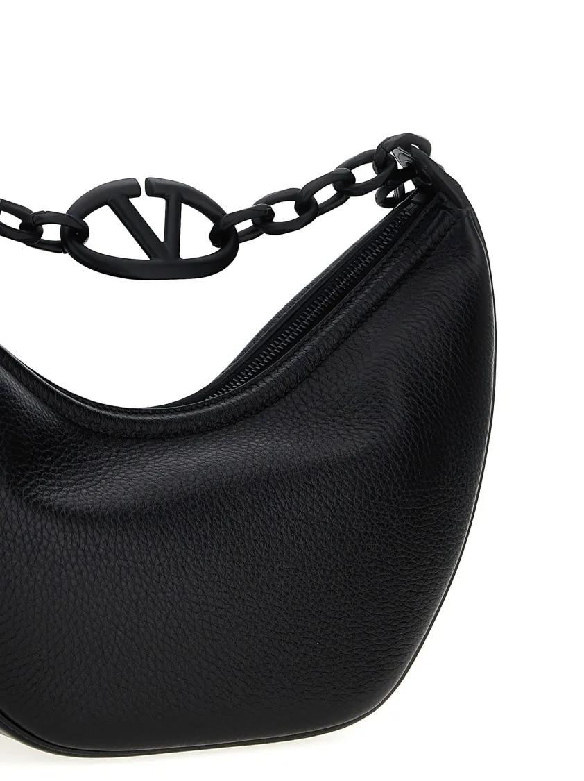 Valentino Garavani Hobo bags Curved Black Calfskin Hobo Shoulder Bag in zwart