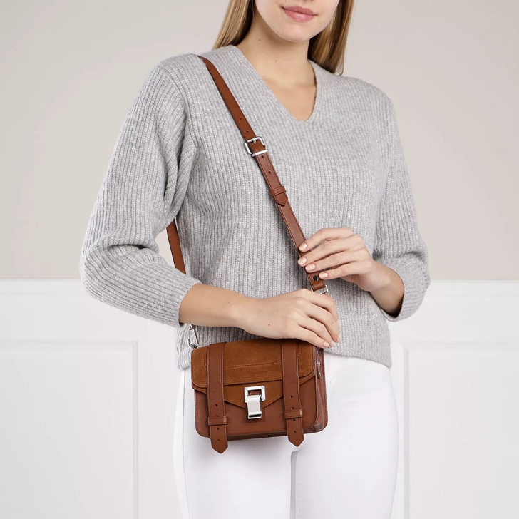 Mini cross outlet over bag