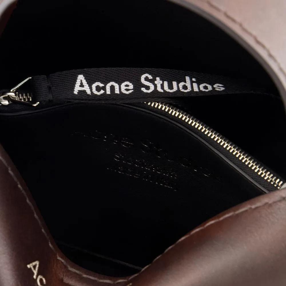 Acne Studios Hobo bags Musubi Mini Aged R Crossbody Leather Brown in bruin