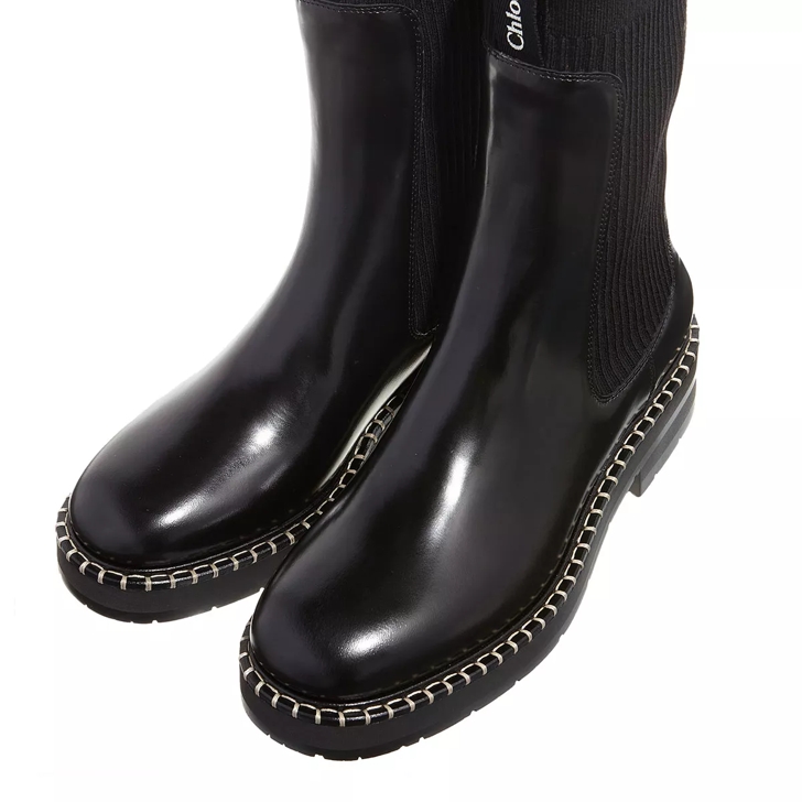 Black shiny boots online