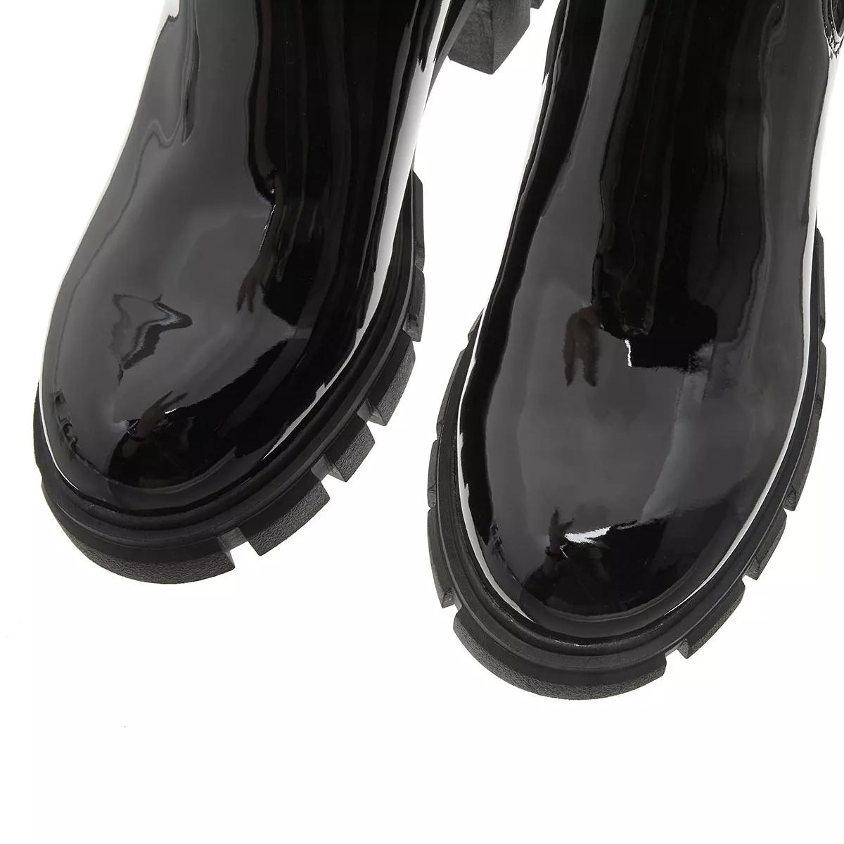 Steve madden patent leather on sale boots