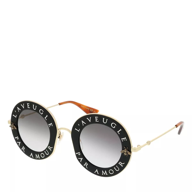 Round frame hotsell metal gucci sunglasses