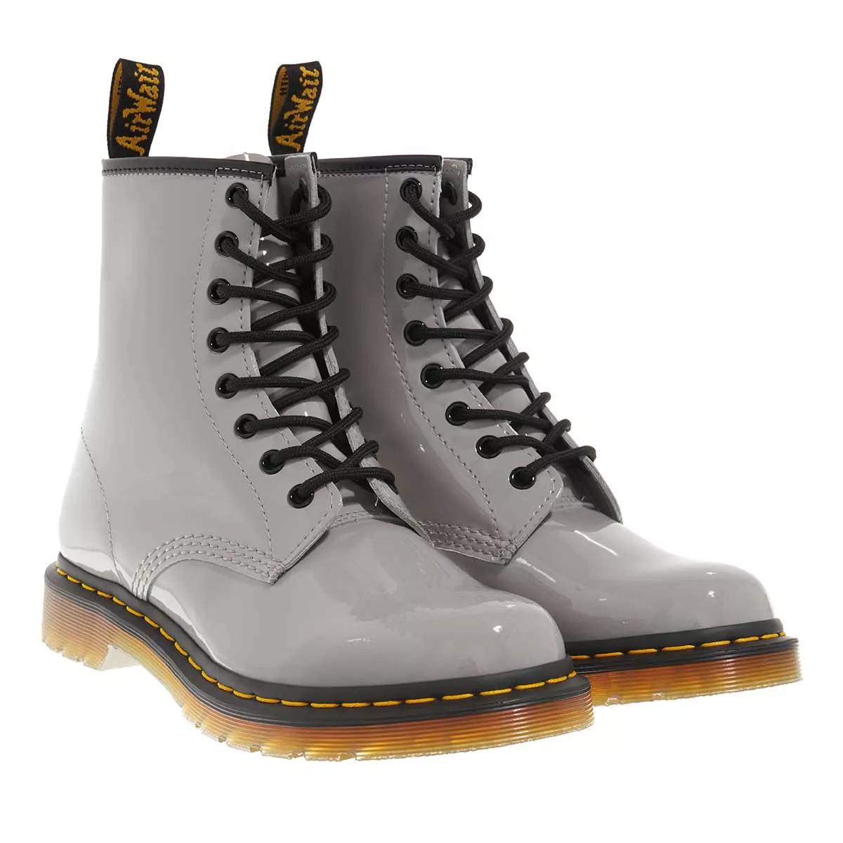 Grey patent outlet boots