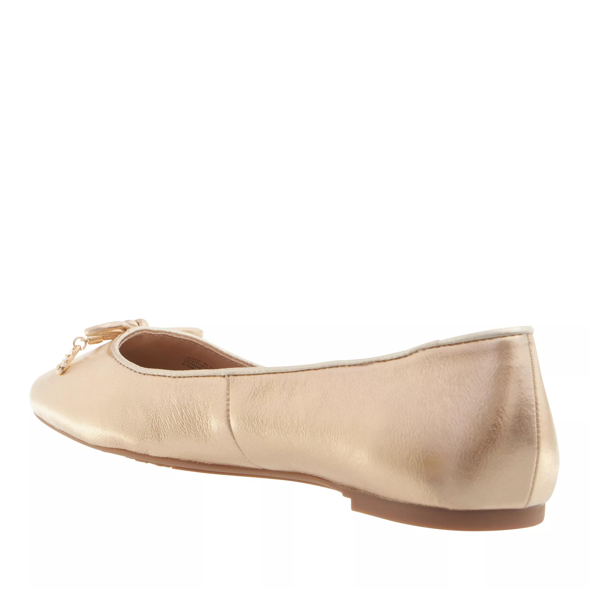 Michael kors deals flats gold