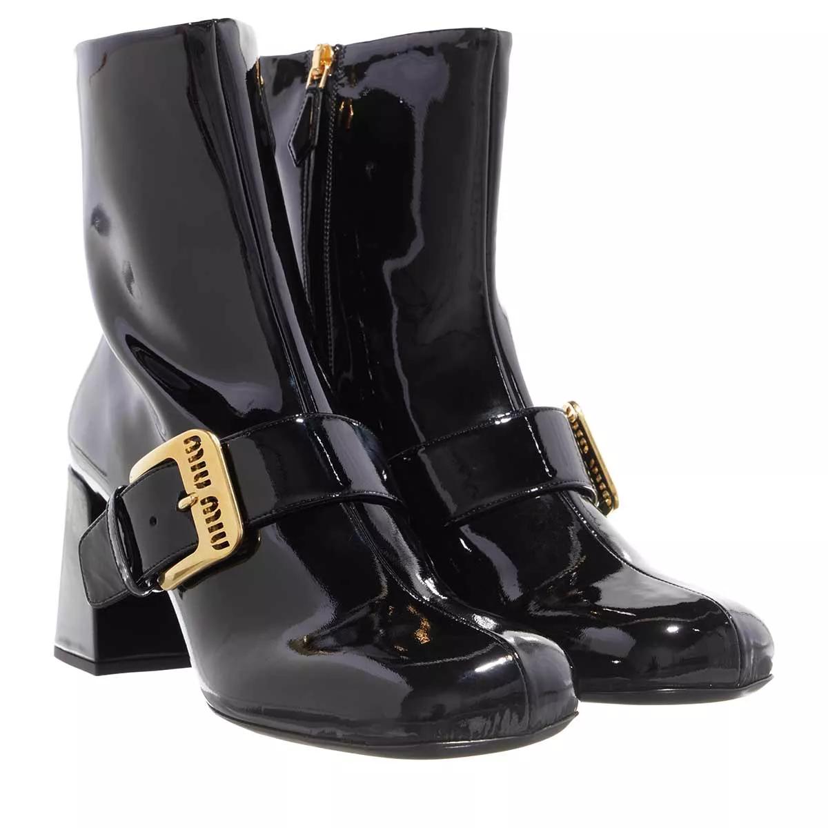 Miu miu patent store leather ankle boots