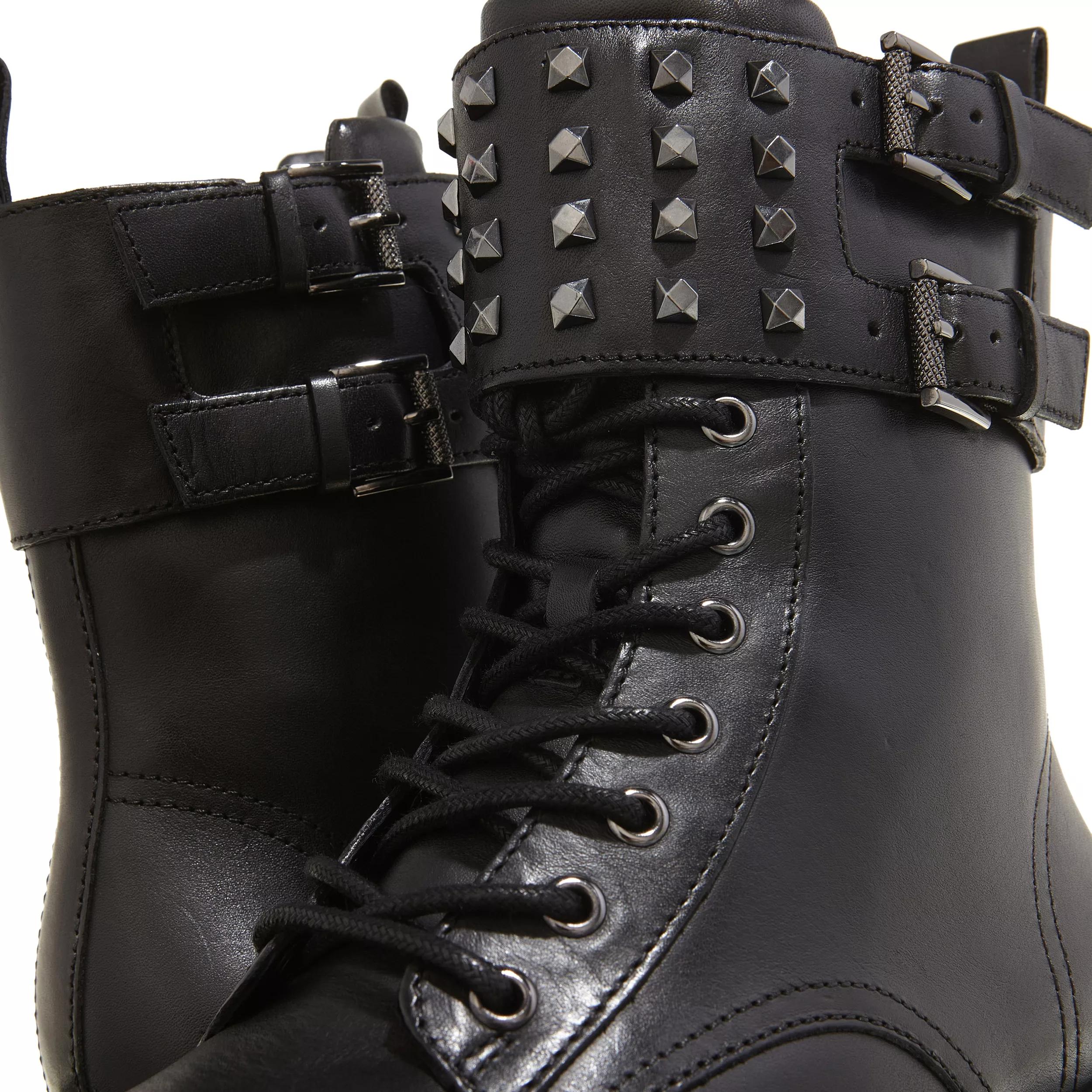 combat boots with spikes