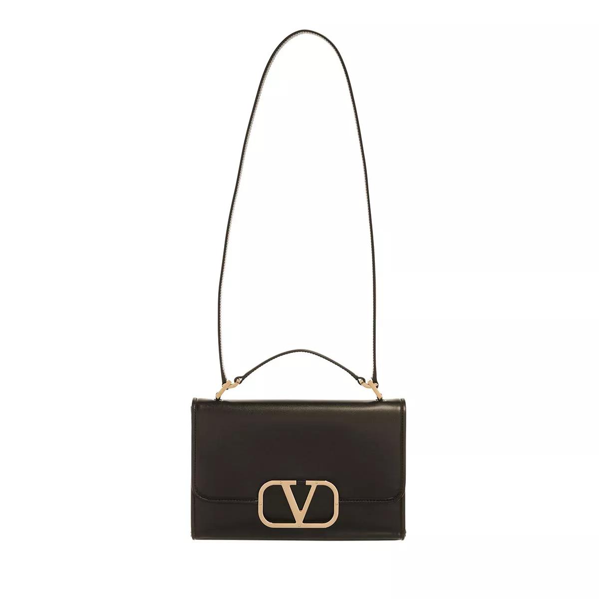 Valentino best sale bag logo