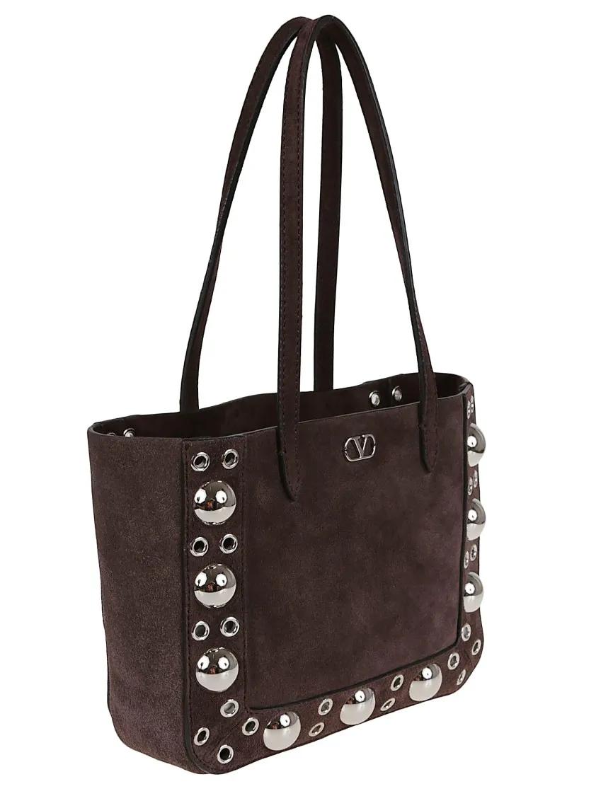 Valentino Garavani Shoppers & Totes Nellcôte Mini Suede Tote Bag in bruin