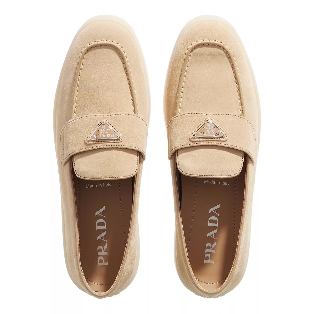 Logo leather loafers in brown - Prada