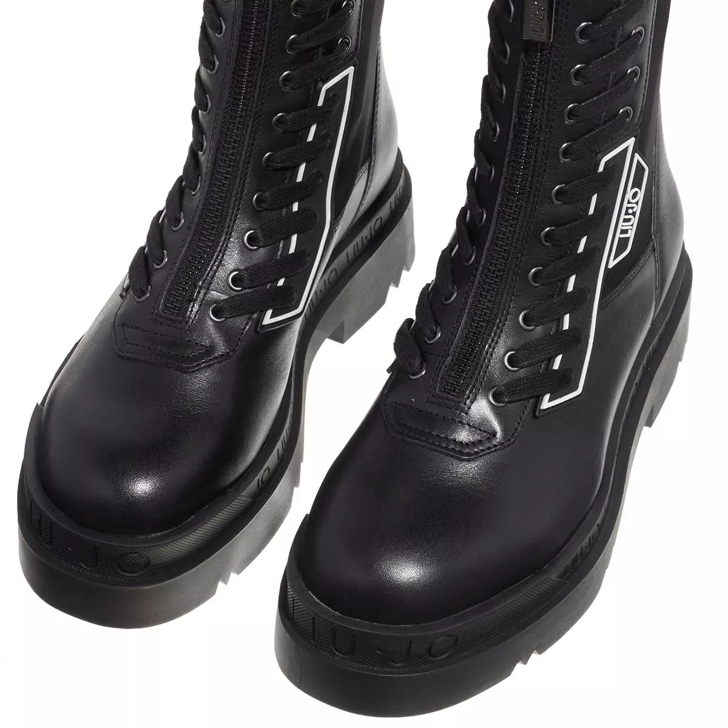 Buy Louis Vuitton Boots in Black