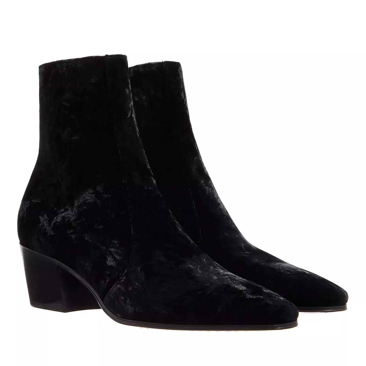 Saint laurent hot sale black boots