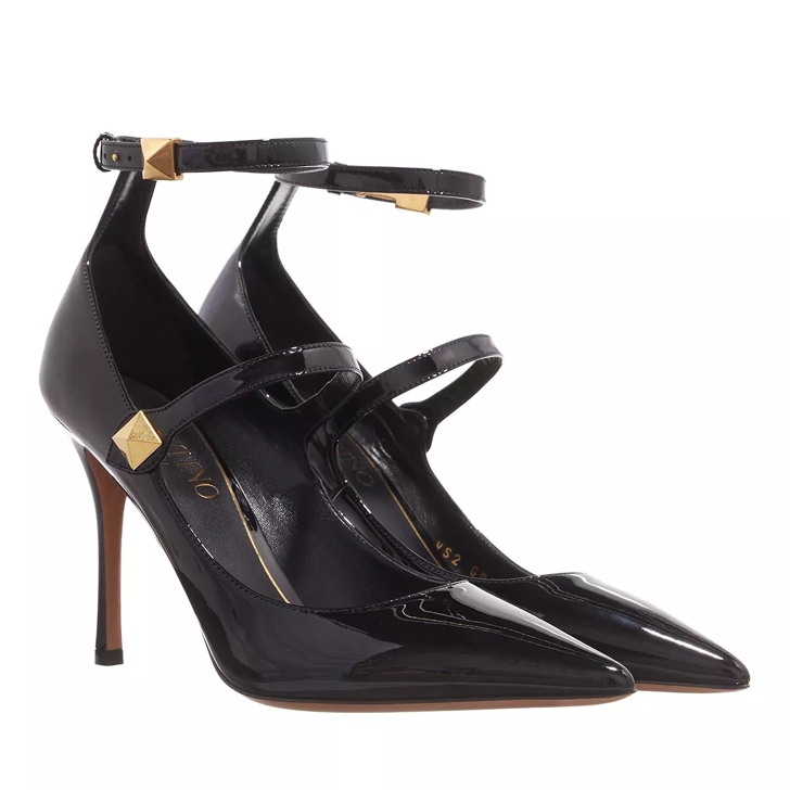 Black patent ankle outlet strap heels