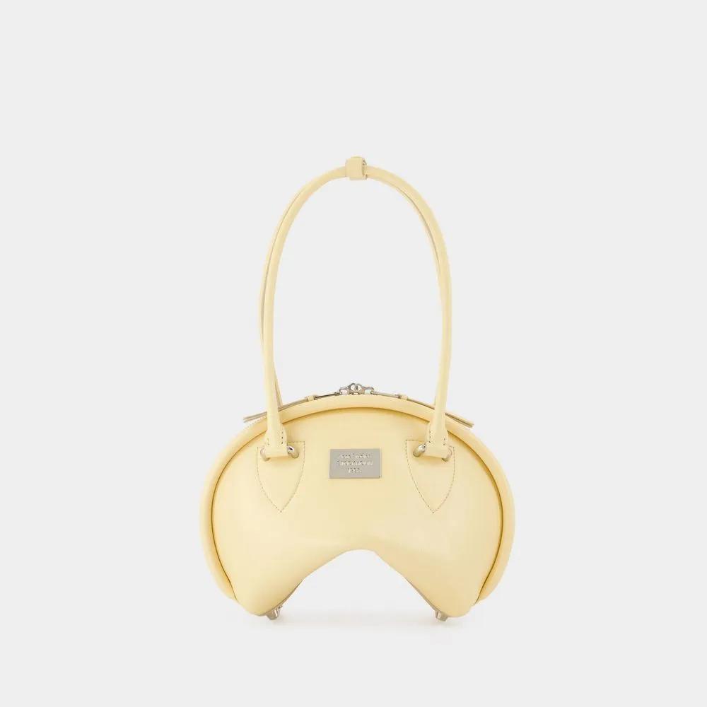 Acne Studios Hobo bags Bowlina Mini Shoulder Bag Leather Yellow in geel