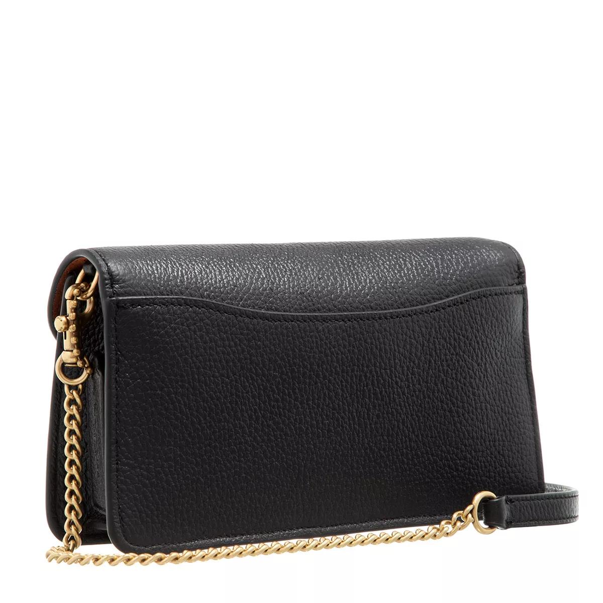 small black coach clutch