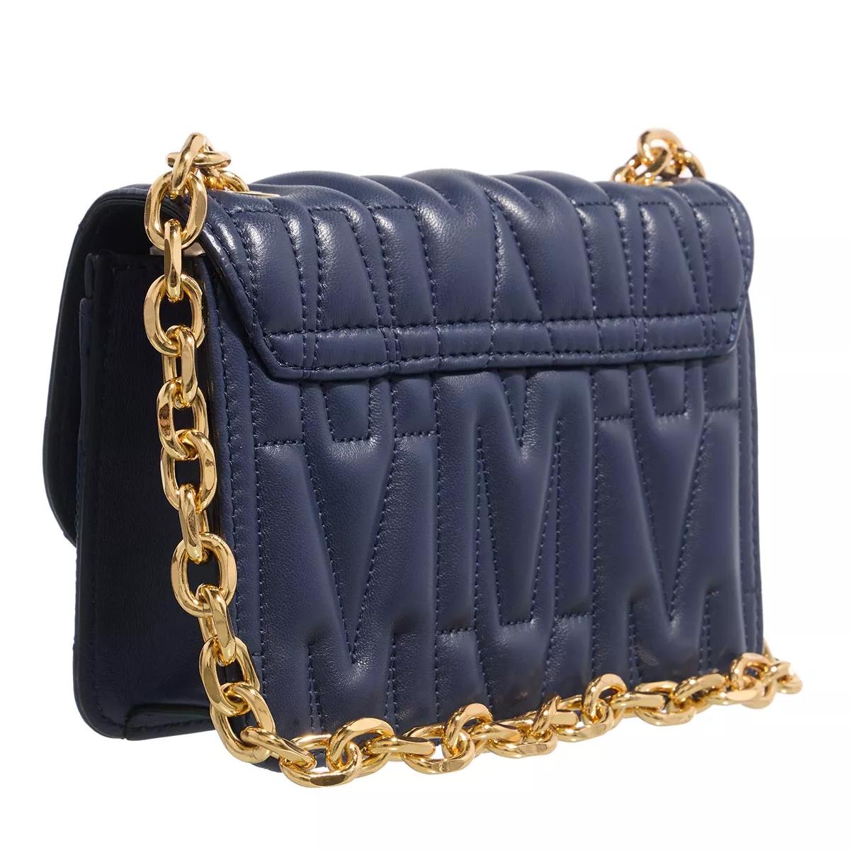 Blue quilted bag hotsell