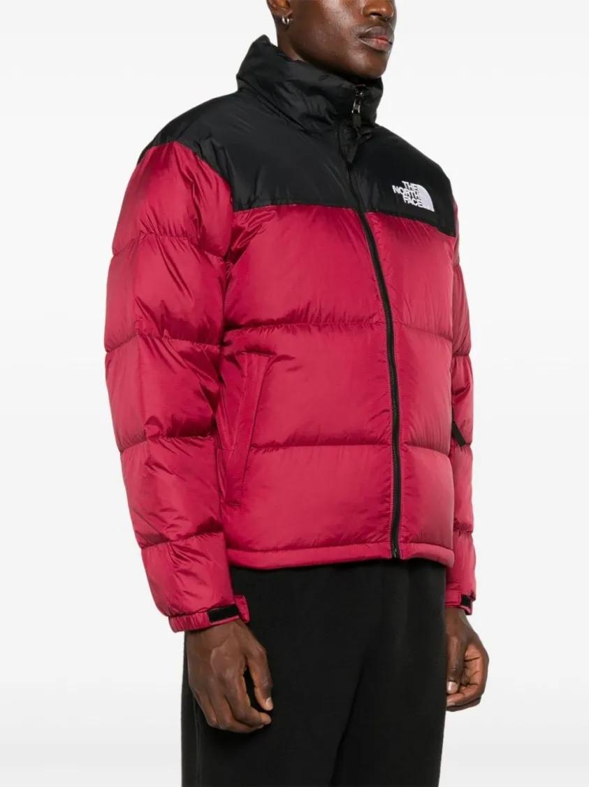 Black north face jacket with red logo hotsell