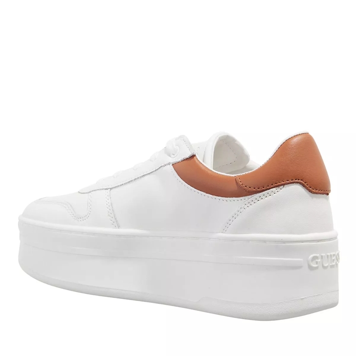 White platform best sale slip on sneakers