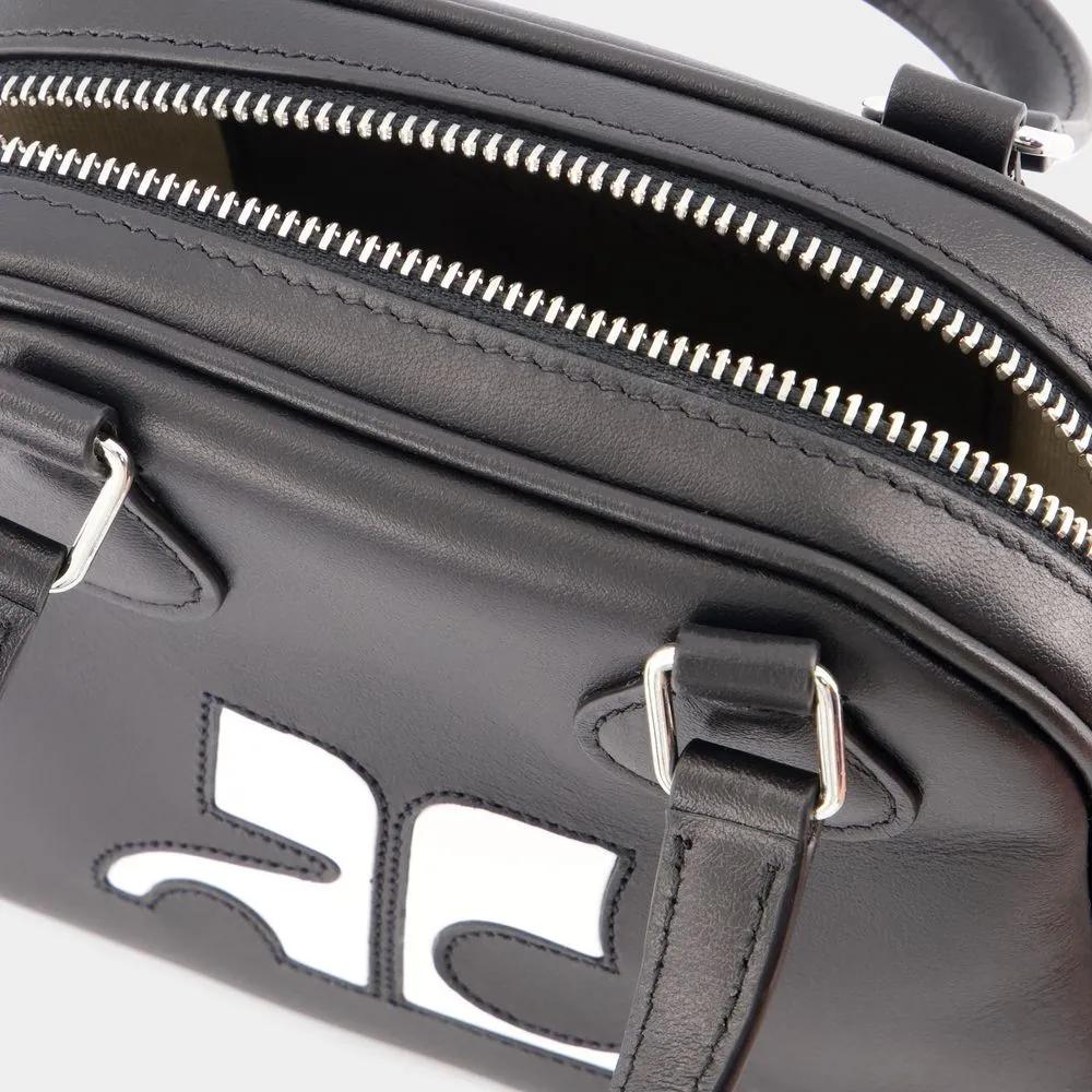 Courrèges Crossbody bags Reedition Mini Bowling Bag Leather Black in zwart