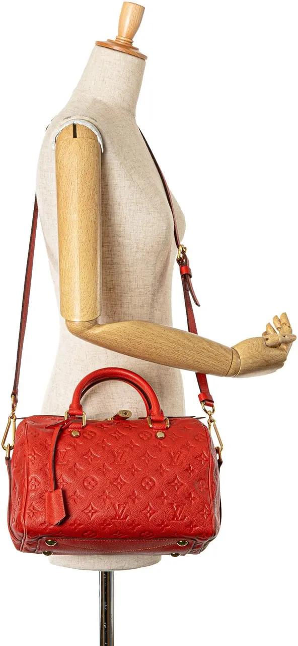 Louis Vuitton Totes & shoppers Monogram Empreinte Speedy Bandouliere 25 in rood