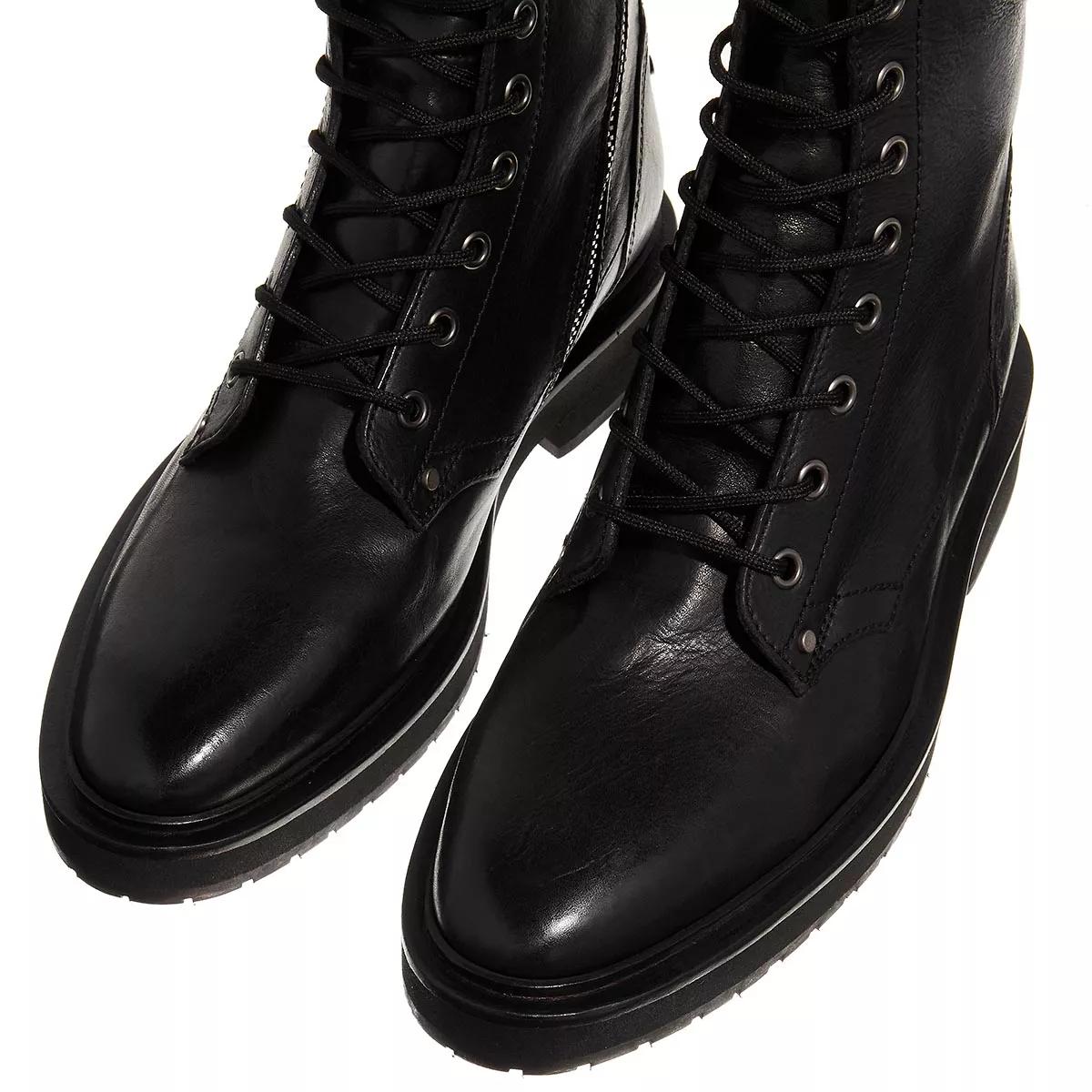 Saint laurent combat boots hot sale mens