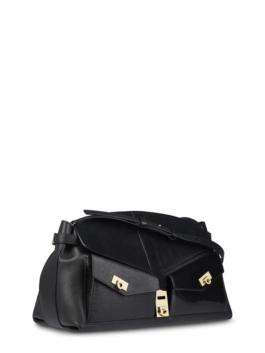 Salvatore Ferragamo Hobo bags Structured Black Pouch With Textured Panels in zwart