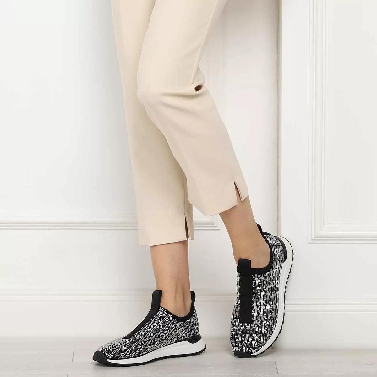 Michael kors best sale slip on white