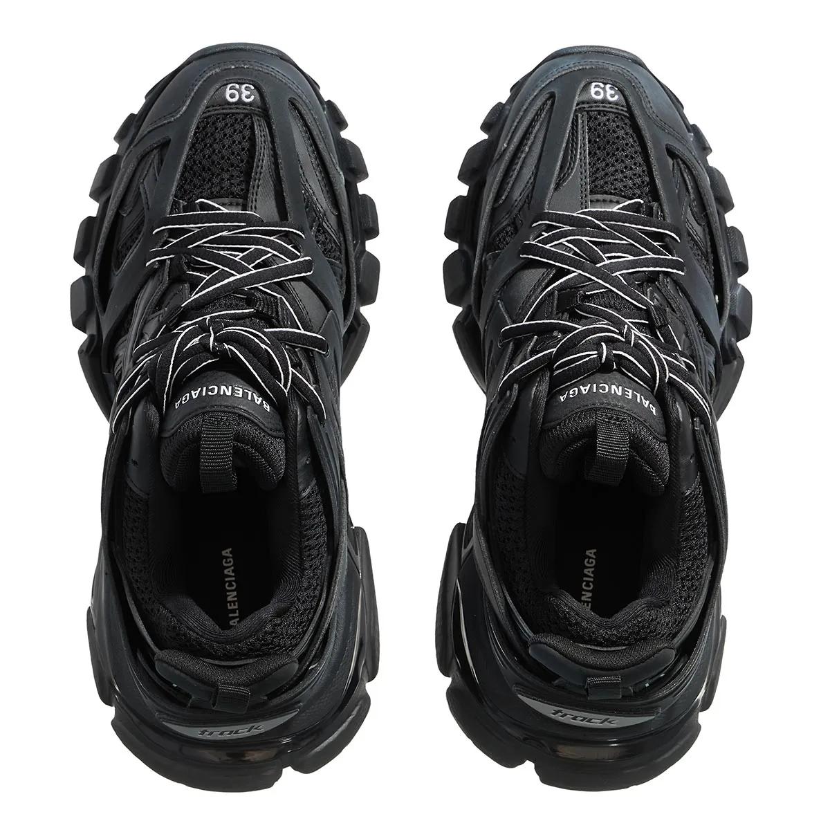 Black track sneakers on sale