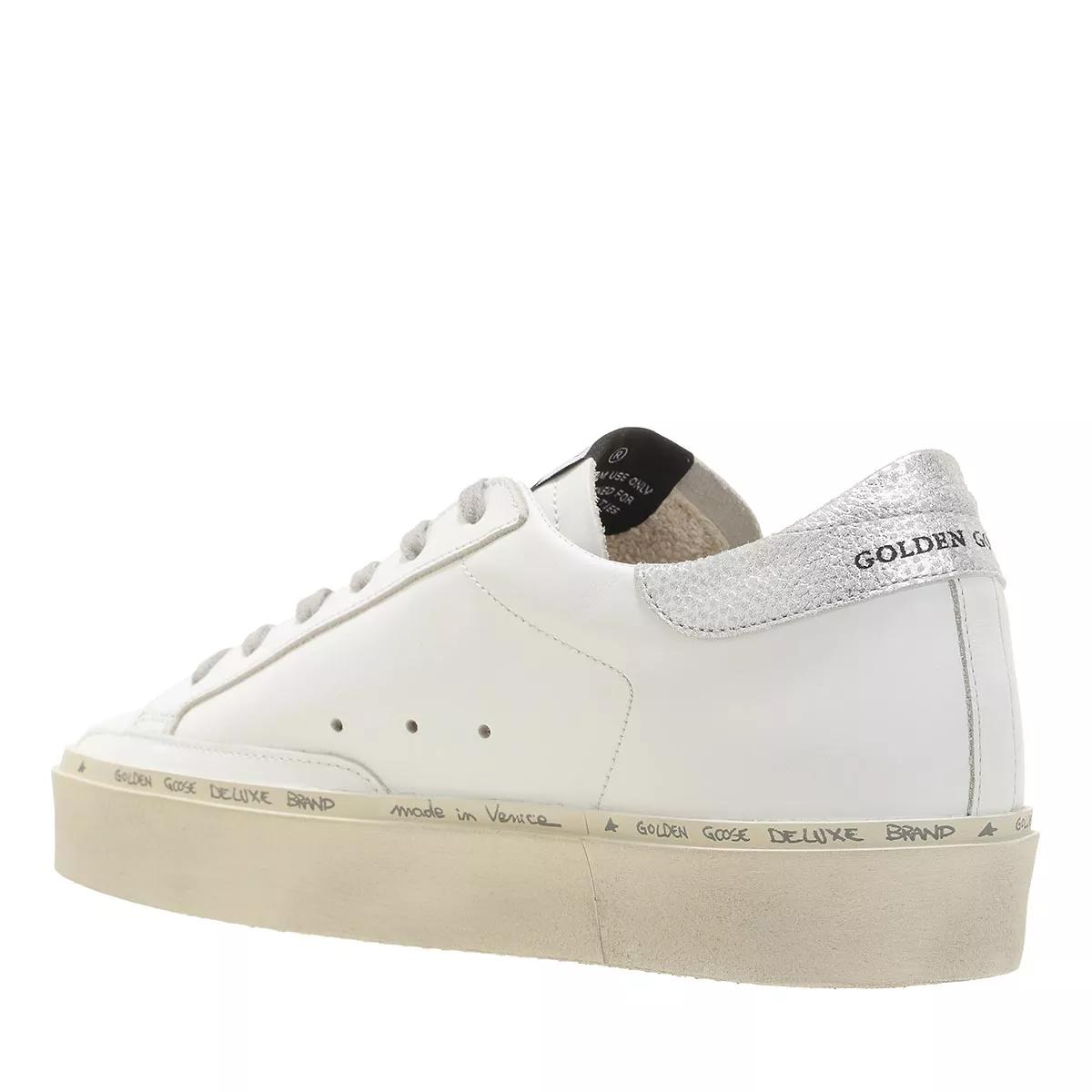 White sneakers best sale with silver stars