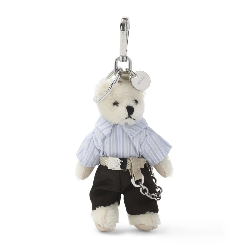 Prada  White Steel Clutch With Playful Teddy Bear Keychai Neutrals