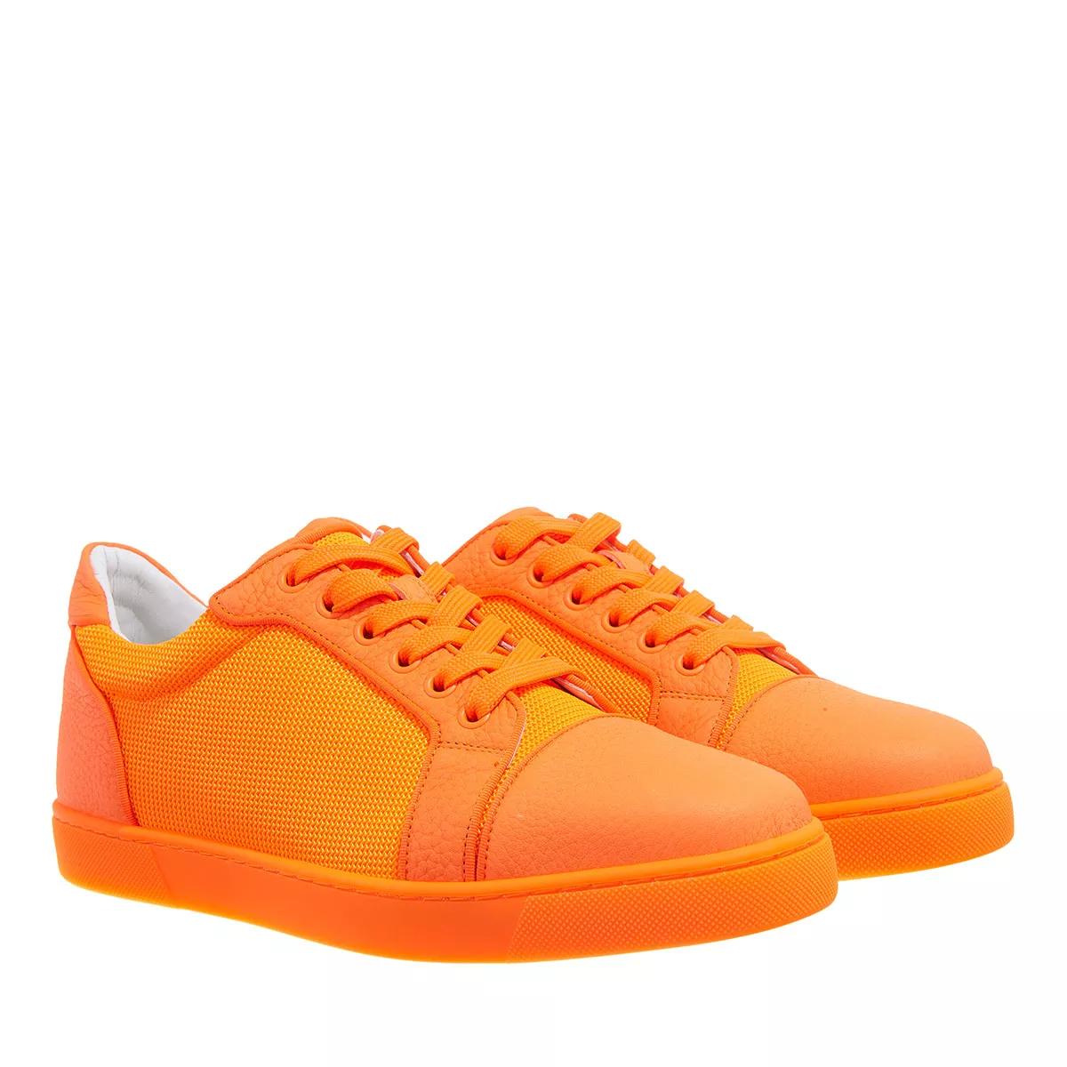 Orange louboutin store sneakers