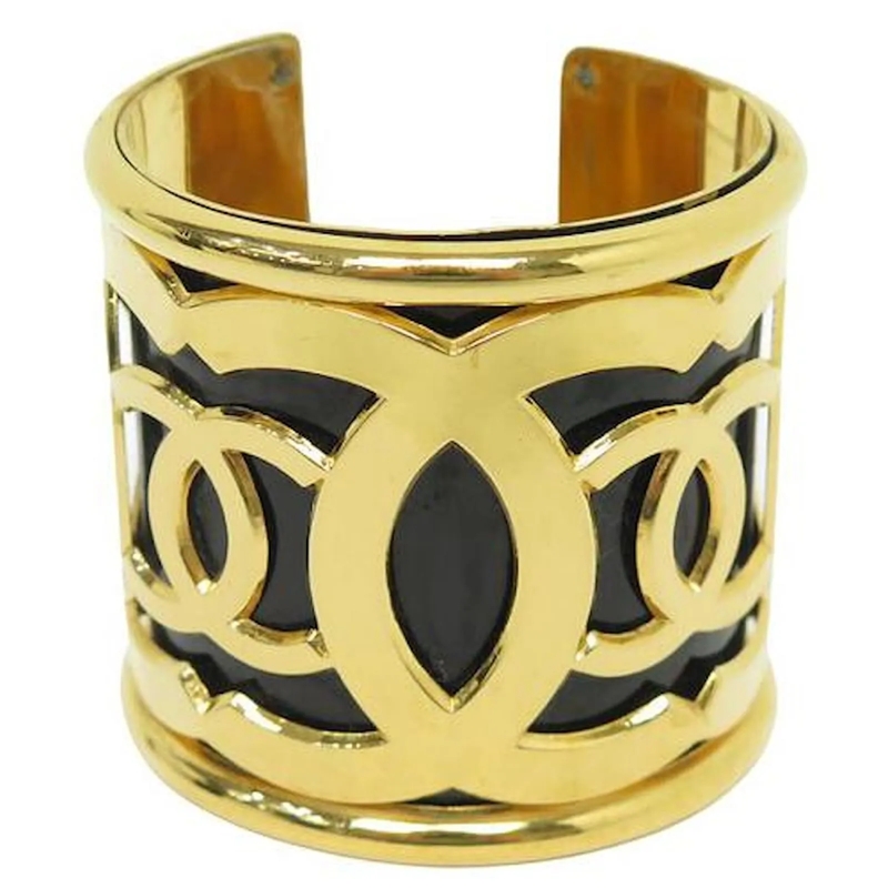 Chanel Armband VINTAGE ARMBAND CHANEL MANCHETTE LOGO CC 1970 T17  gold