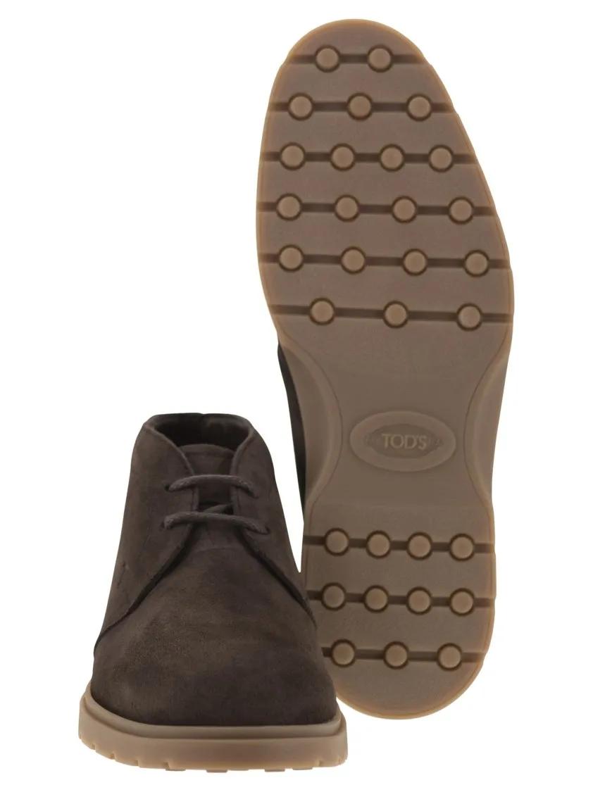 Thumbnail - Tod's Stiefel - Rich Suede Ankle Boots With Embossed Monogram - Gr. 7_5 - in Schwarz - für Damen