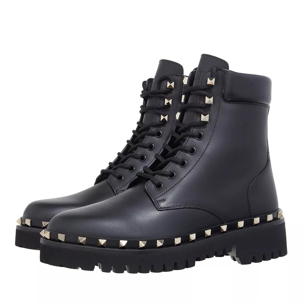 Black studded combat boots on sale