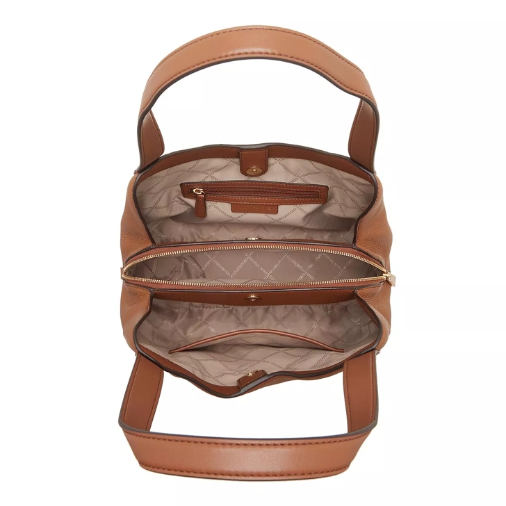 Fossil vs michael kors bags 2025