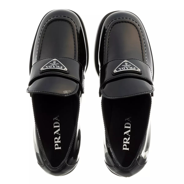 Logo leather loafers in brown - Prada