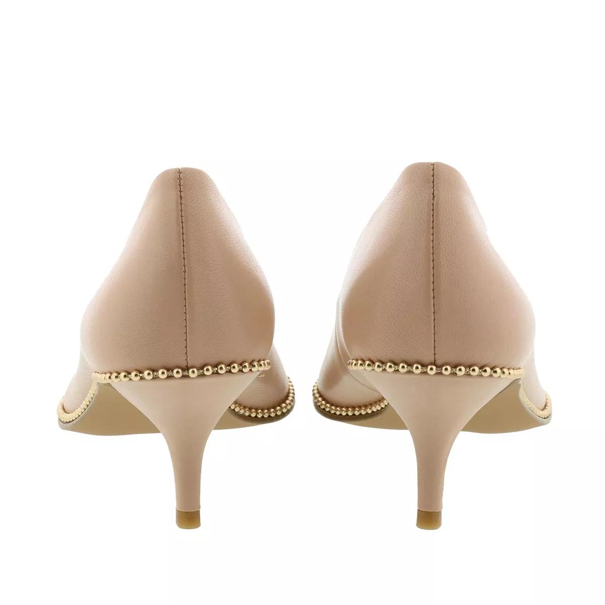 Coach hot sale nude pumps