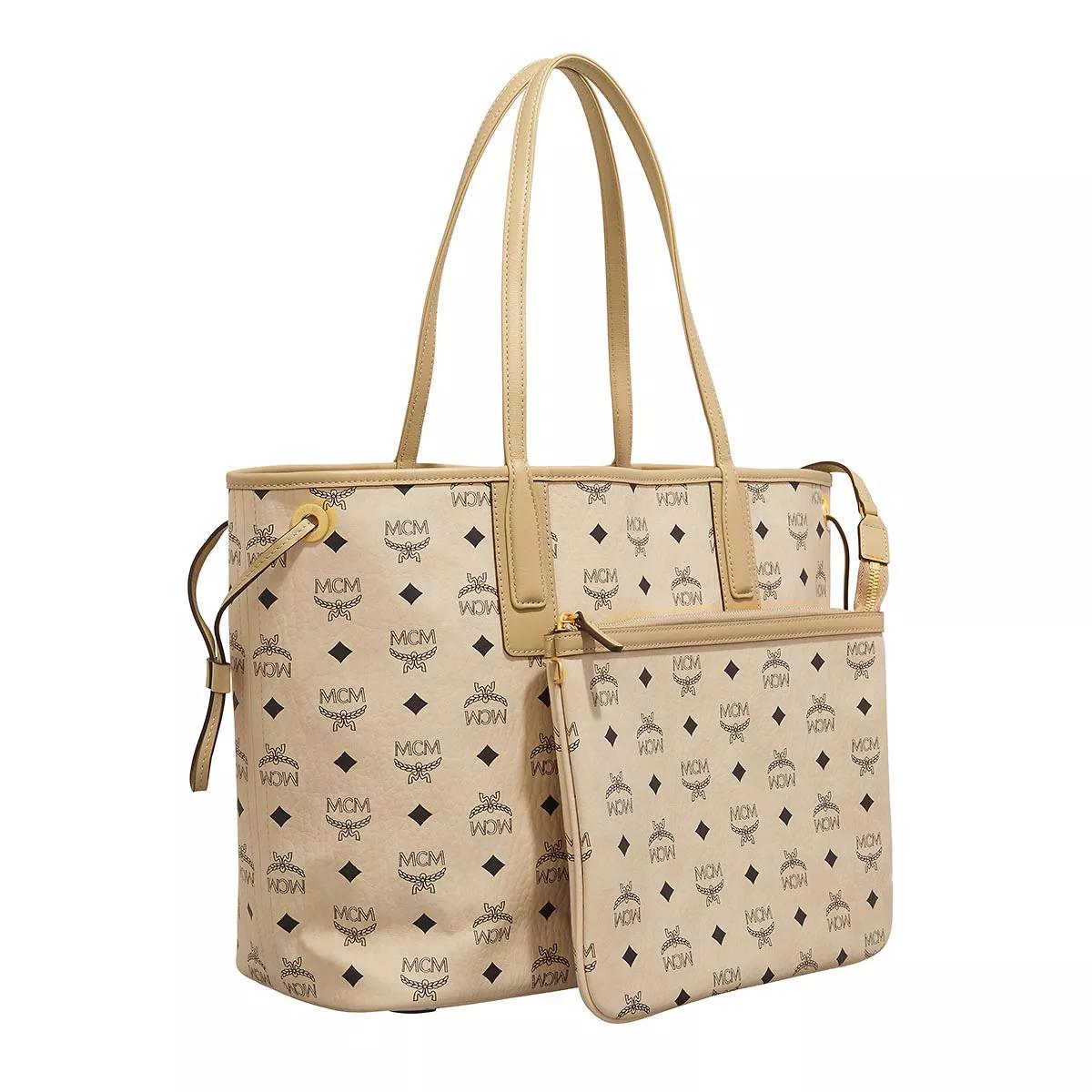 Mcm pochette beige hot sale