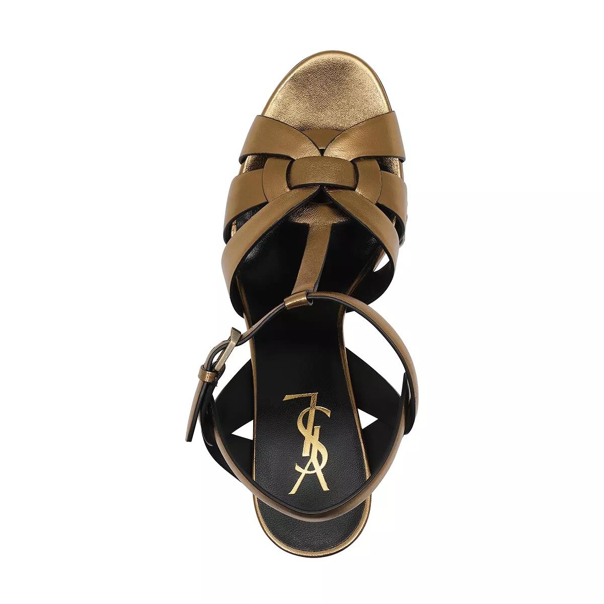 Saint Laurent Pumps & high heels Tribute Plateau Sandals in goud