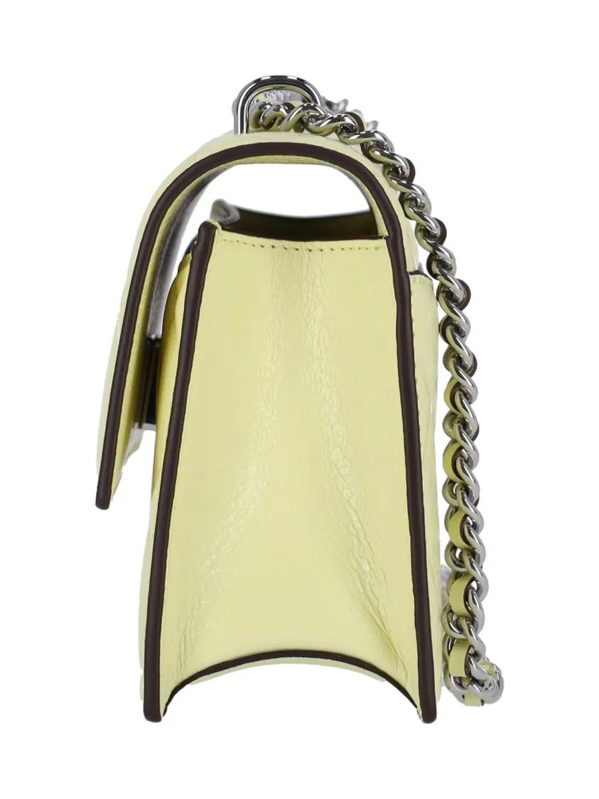 TORY BURCH Hobo bags "Fleming" Small Shoulder Bag – Yellow in geel