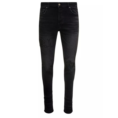 Amiri Black Skinny Jeans With Crystal Embellished Logo A Black Skinny Leg Jeans