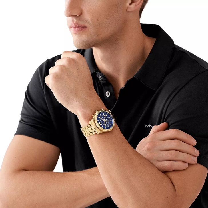 Michael kors black and gold watch hotsell