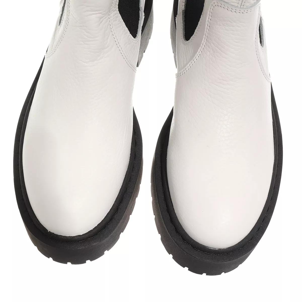 Steve madden black 2025 and white boots