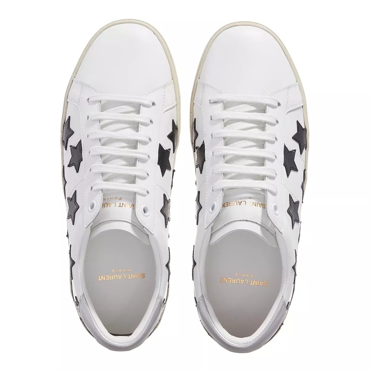 White sneakers with store stars