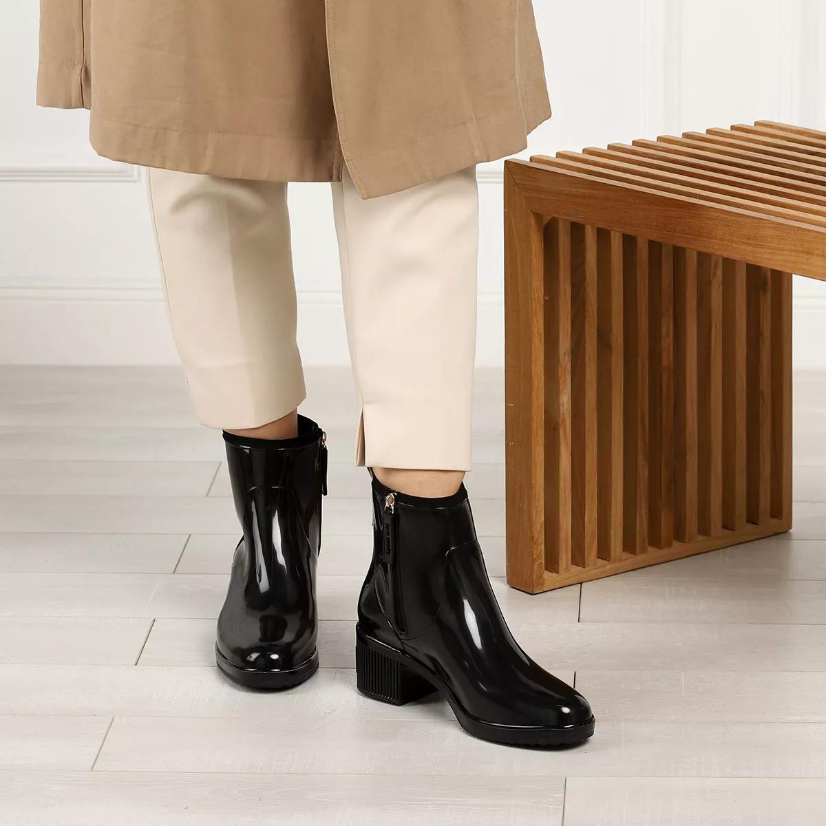 Kate spade malcolm rain hot sale boots